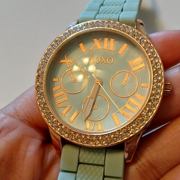 XOXO Women's Rhinestone Accented Rose Gold Watch With Green Silicone Strap - Picture 9 of 14